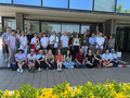 Group photo in front of a building.