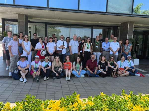 Group photo in front of a building.