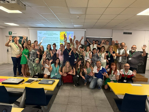 Group photo within a classroom.