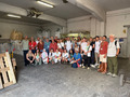 Group photo within a building.