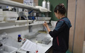 A person doing lab work.