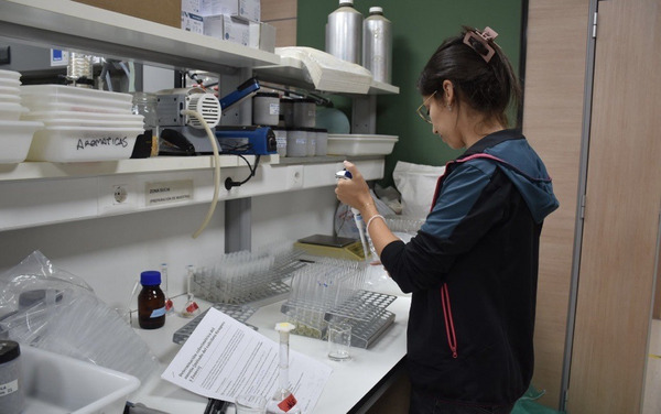 A person doing lab work.
